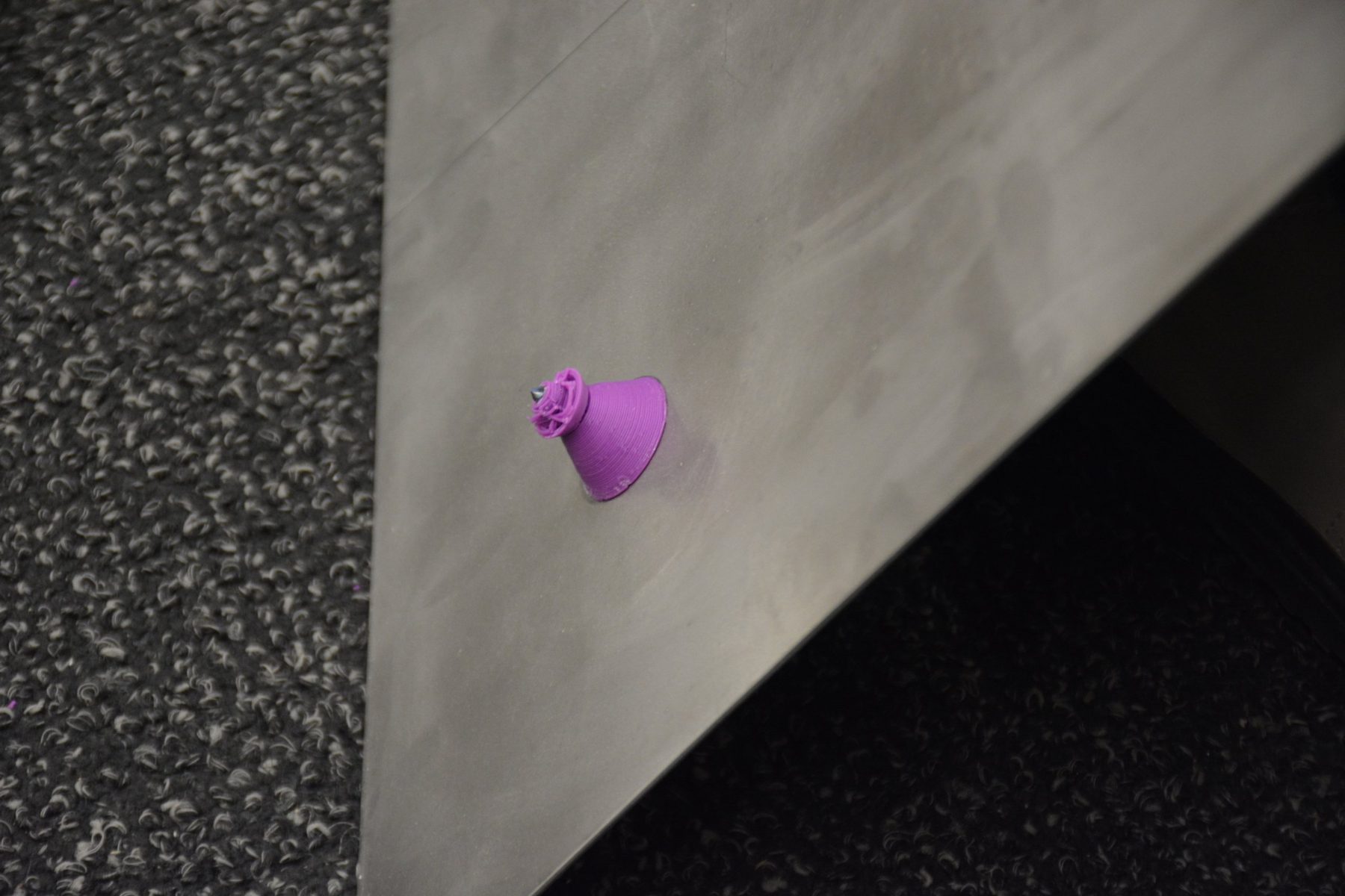 Purple test spacer on a sheet metal panel